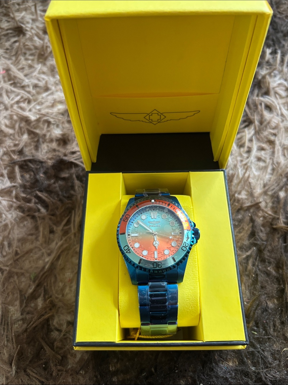 Invicta blue and orange stainless steel diver watch